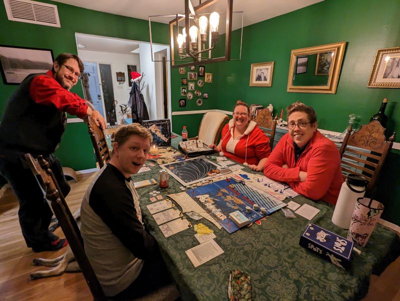 Michael Playing a Boardgame With Friends